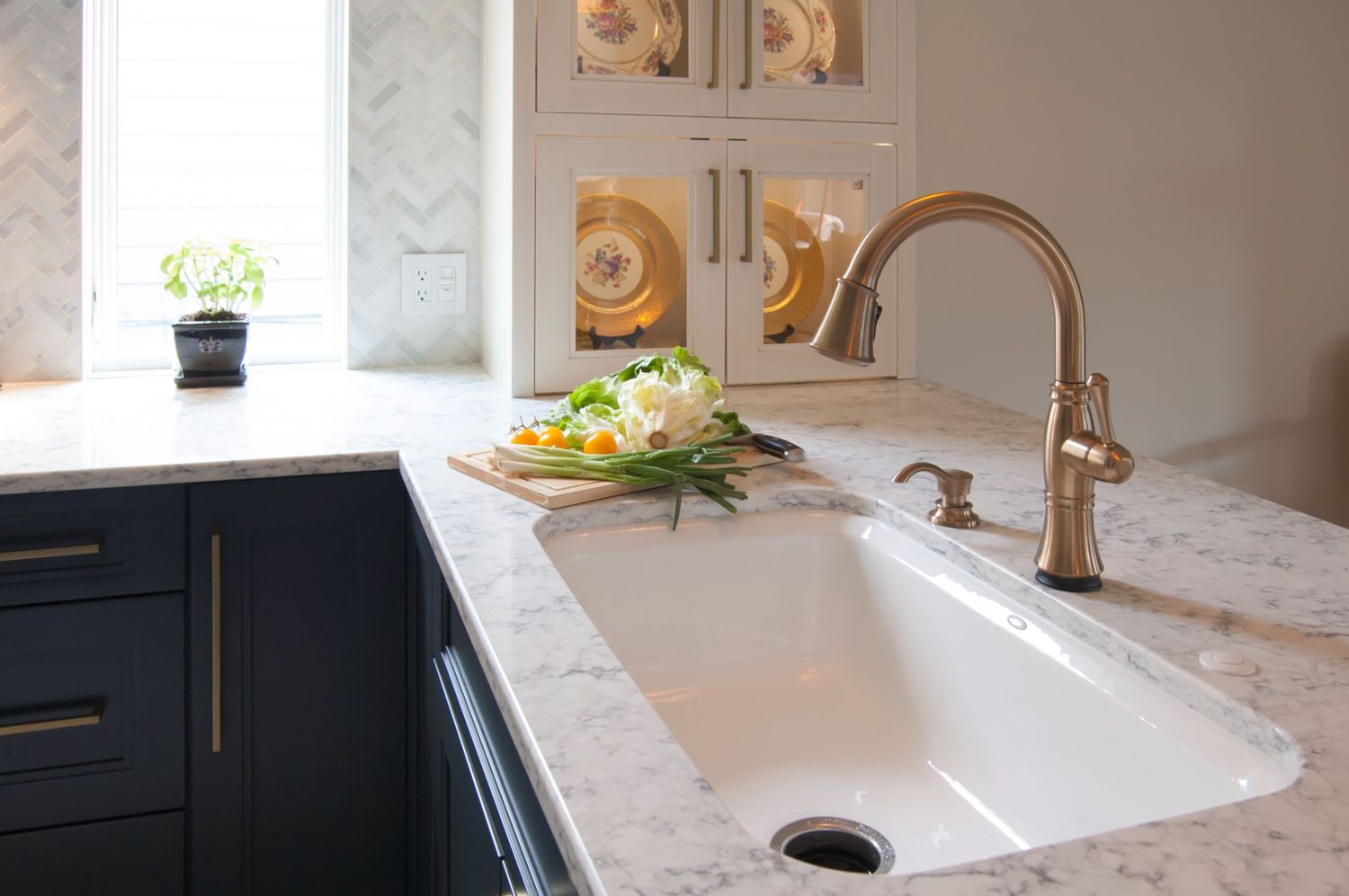 Rococo quartz countertops Delta Cassidy faucet in champagne Bronze kohler Bakersfield sink