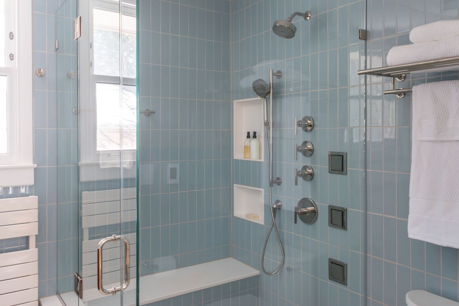 Primary bath shower with body sprays Kohler Purist faucets with Fireclay Egyptian Blue wall tile