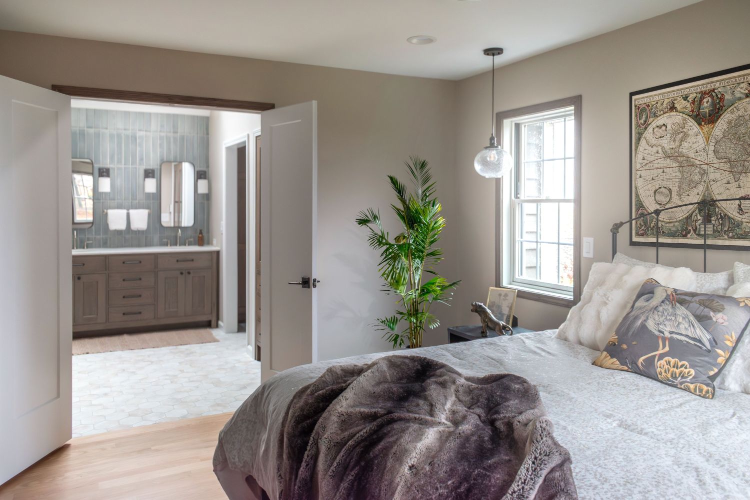 Primary bedroom and bathroom with double doors