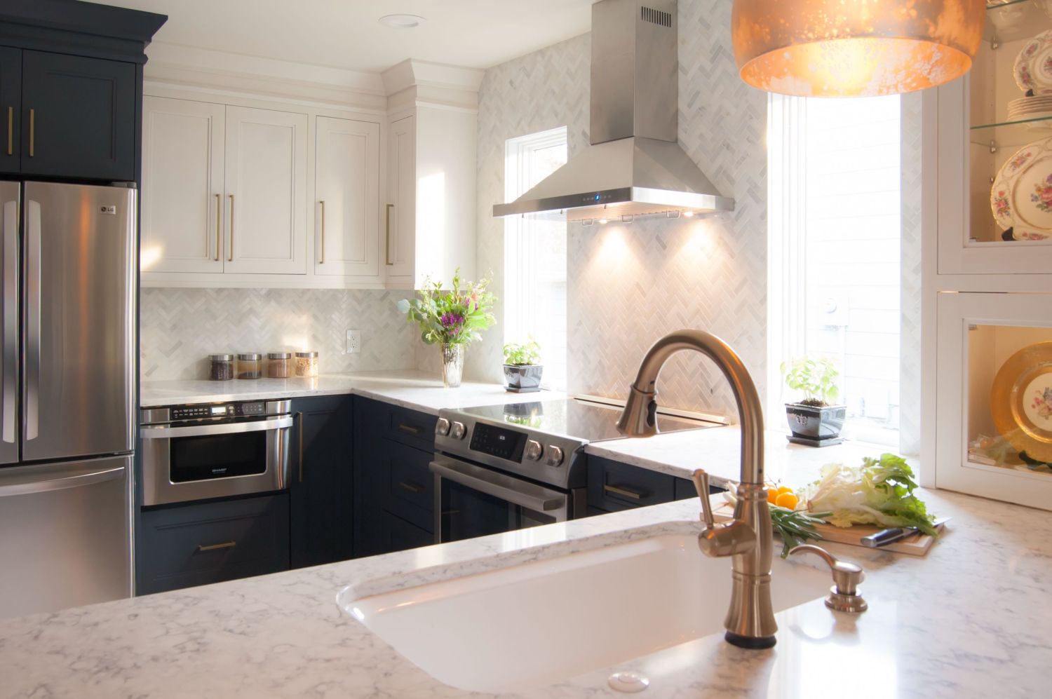 Navy and white Kitchen with peninsula