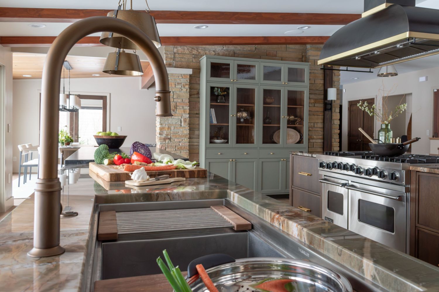 Kitchen island with rohl faucet galley sink botanic quartzite coutnters platowoodworks cabinetry
