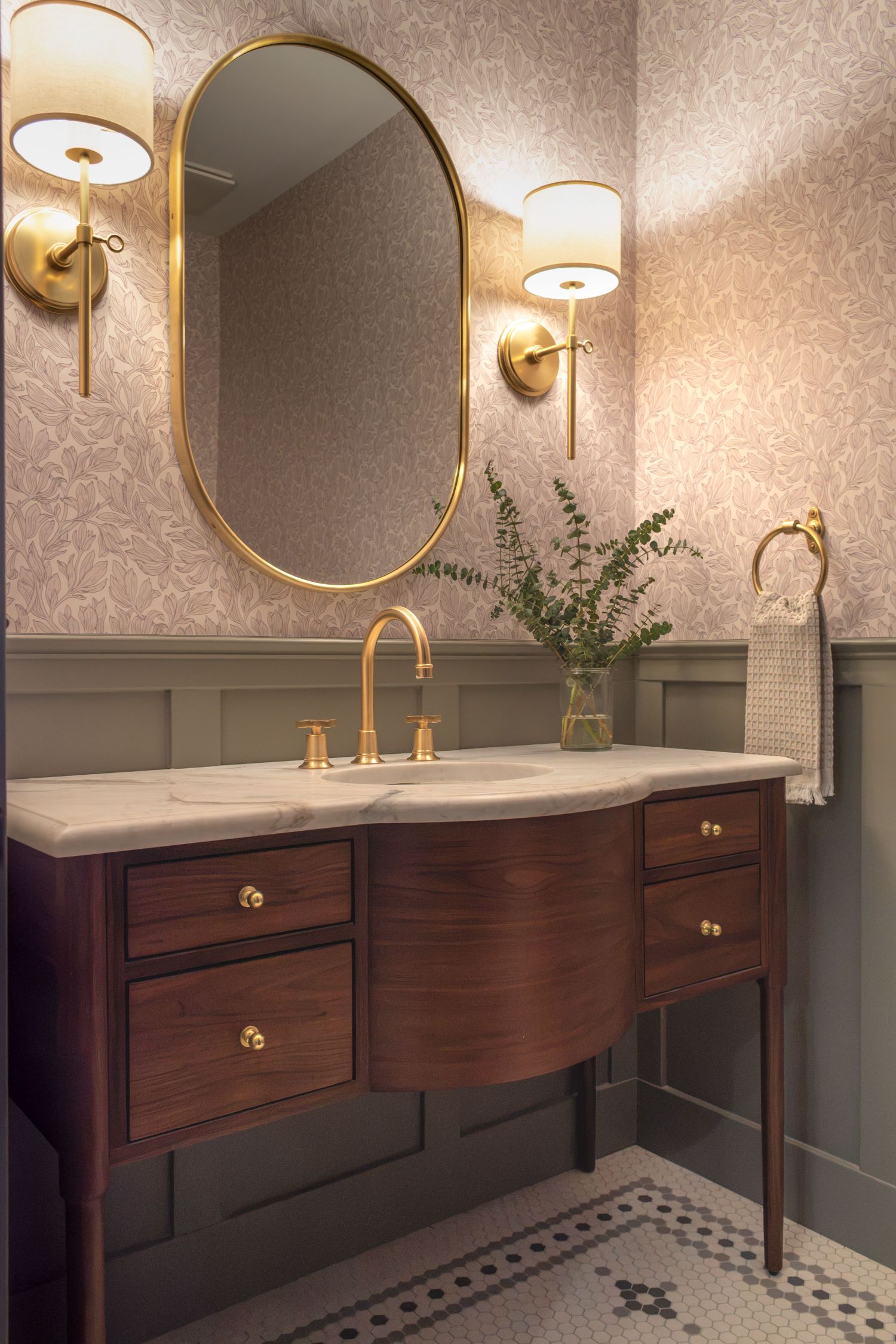 vanity wall in powder room with spoonflower wallpaper Phylrich faucet