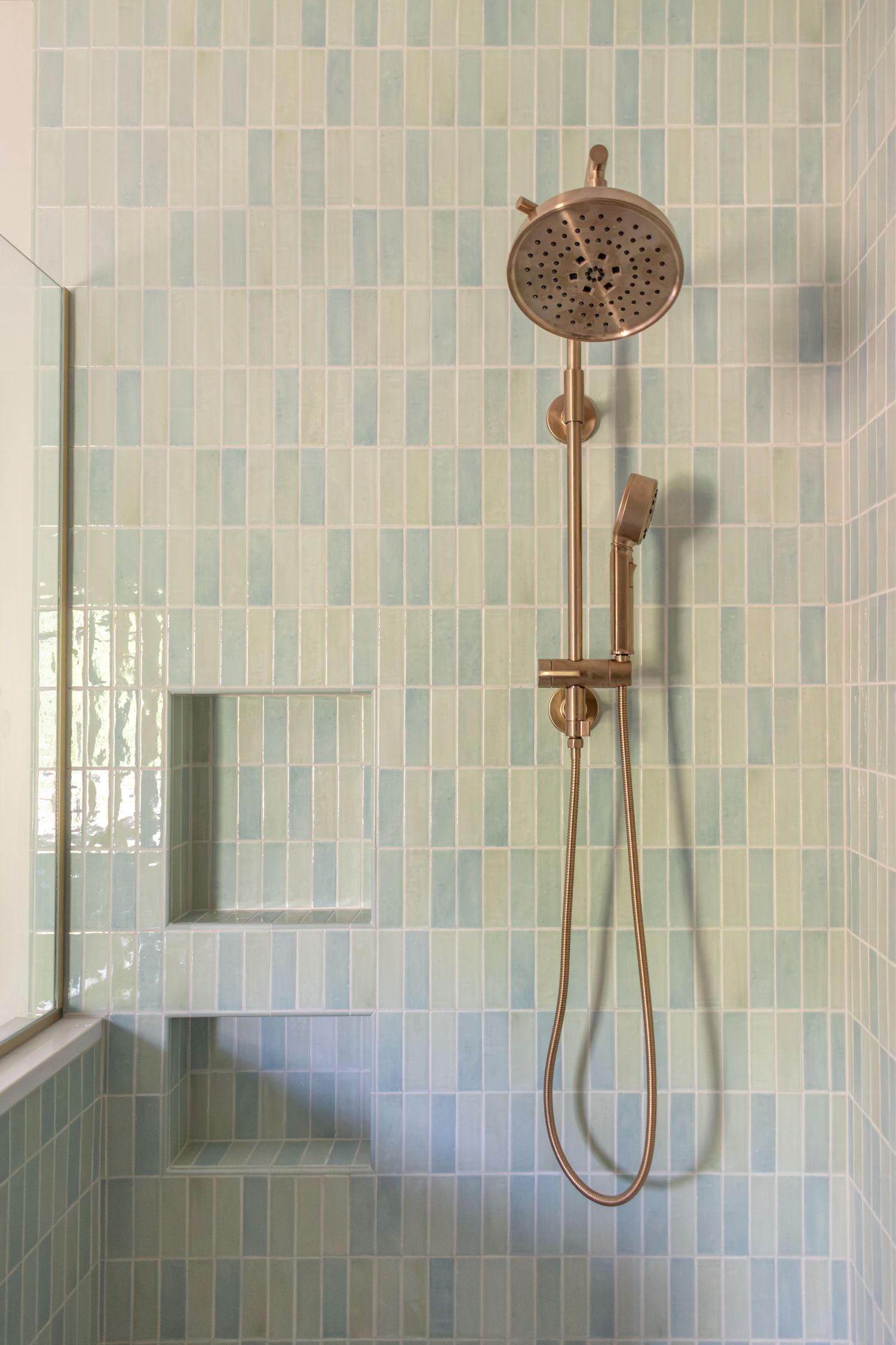 hand shower faucet in primary bath wow tile brio invari