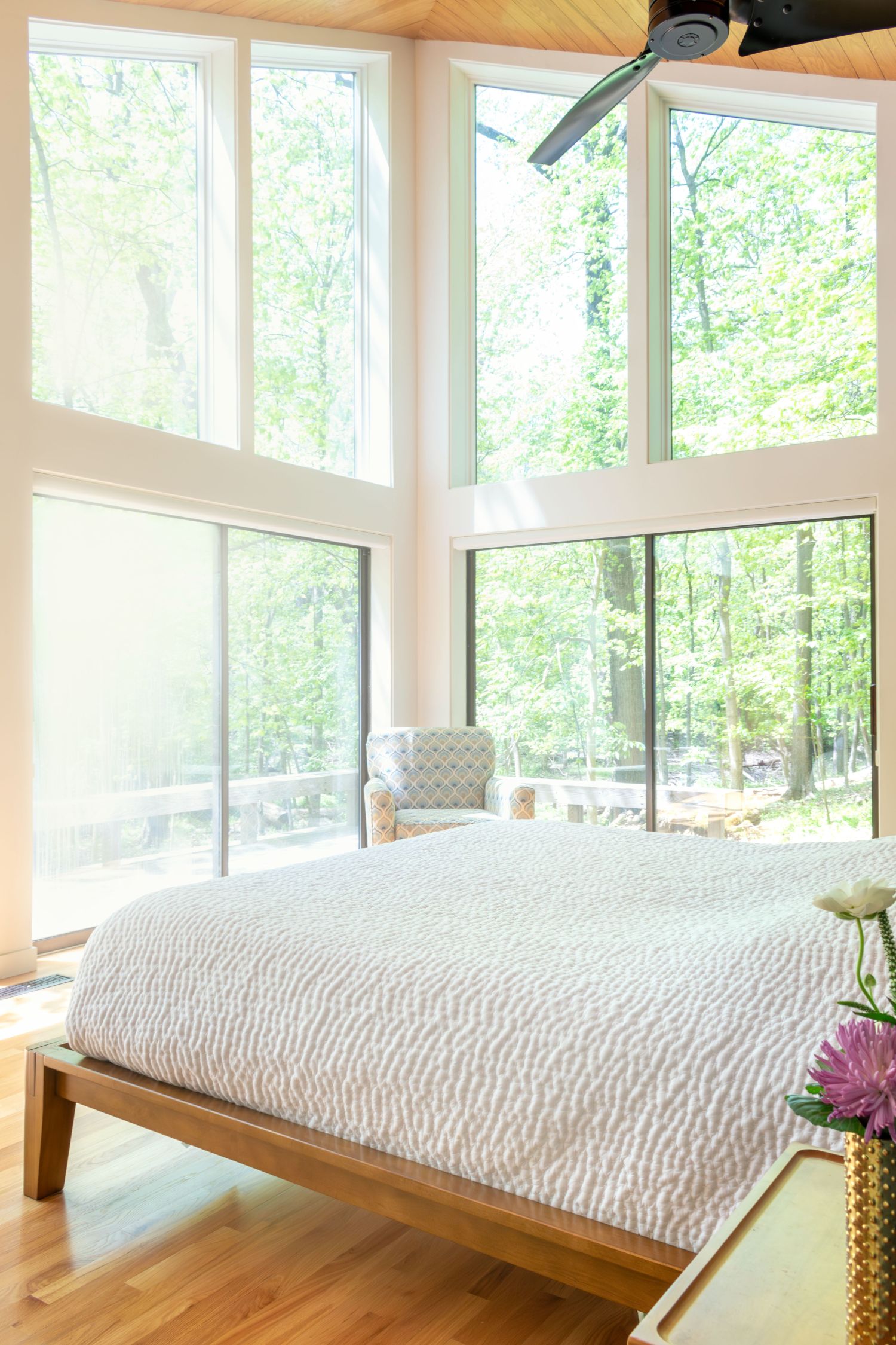 Primary bedroom with full glass walls