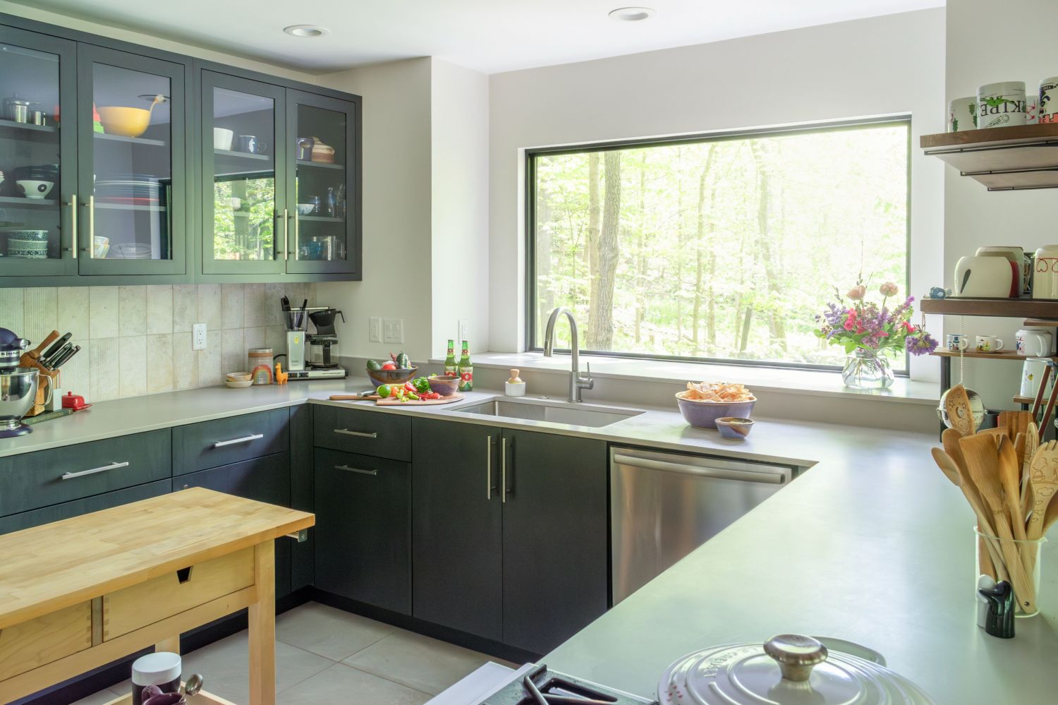 U shaped kitchen with large picture window