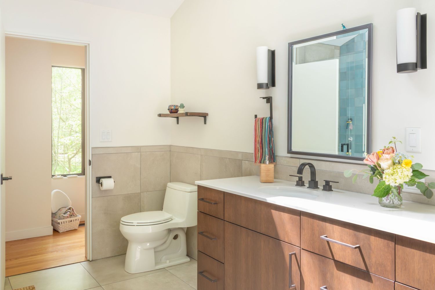 Floating shelf over toilet with Eclipse maple vanity