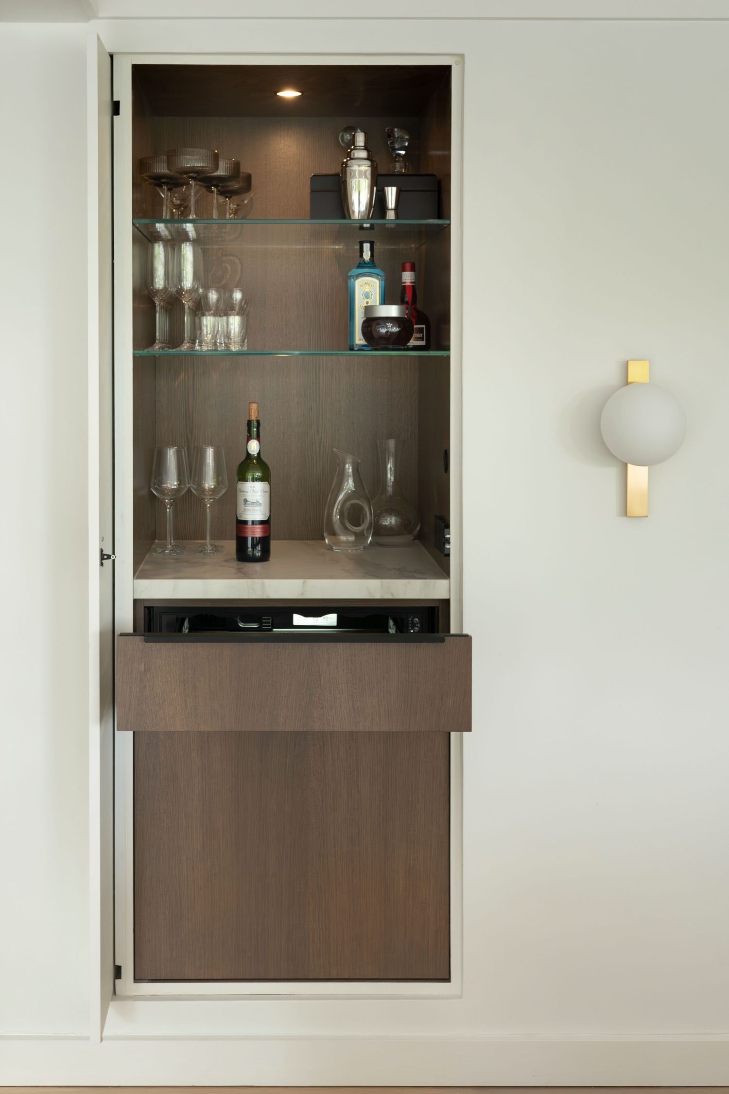 hidden bar revealed with dometic wine drawer in modern kitchen plato woodwork