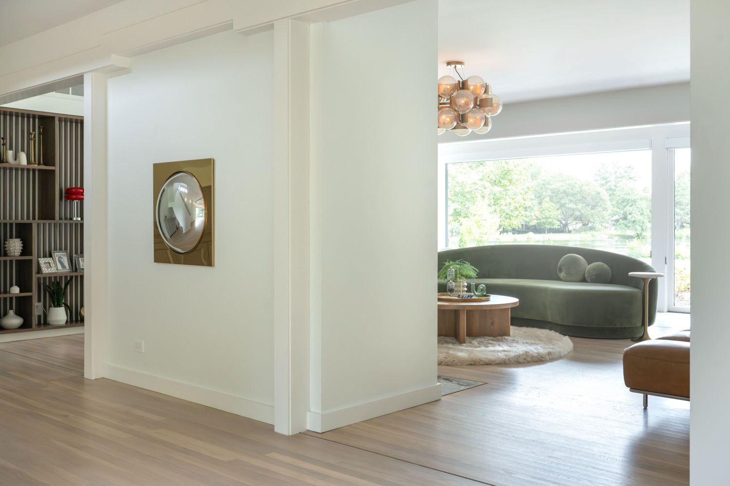 back side of Central fireplace in living area Jonathan Adler mirror