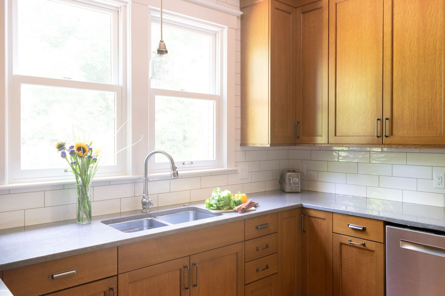 quarter sawn white oak kithen in historic home with large windows and tall celilings