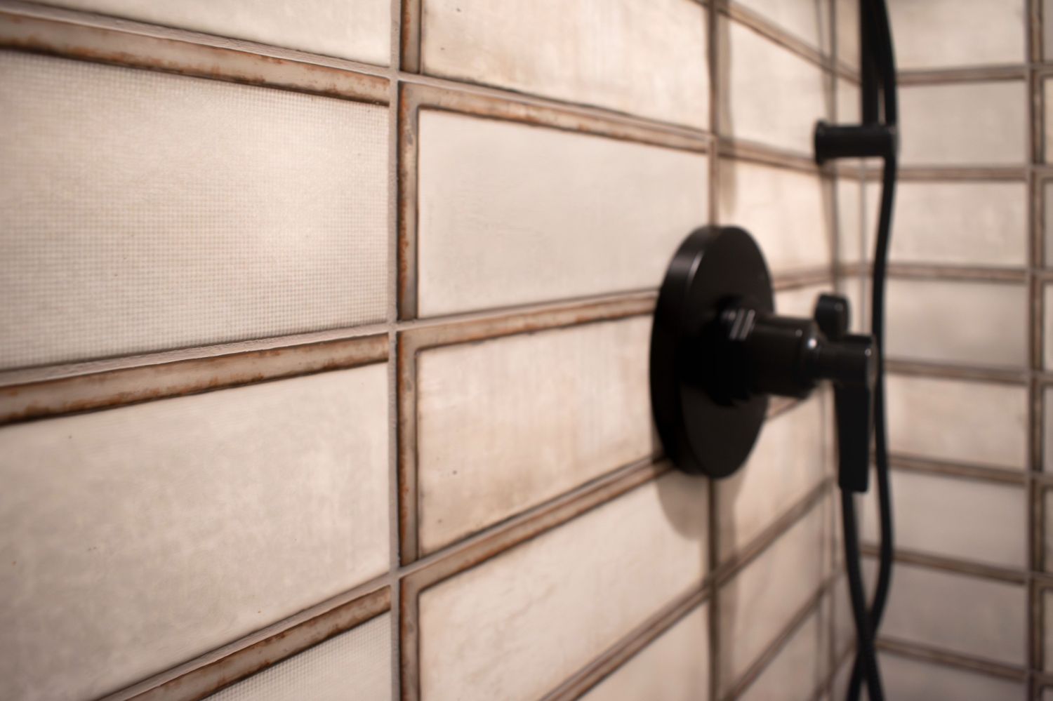 shower wall tile Diesel white with greyfiled shower faucet