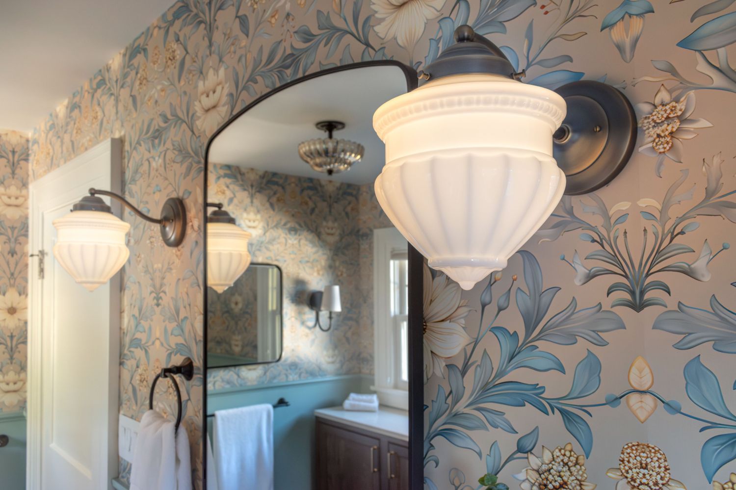 rejuvenation rose city wall sconces spoonflower wallpaper arched mirror in bathroom