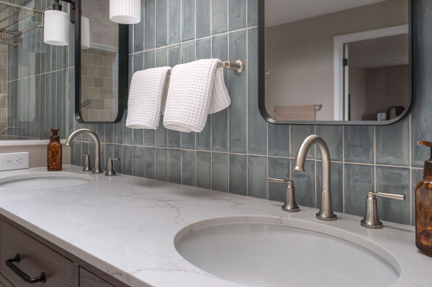 Vadara Oasta Dawn quartz vanity top with Delta Saylor Faucets Metal framed mirrors